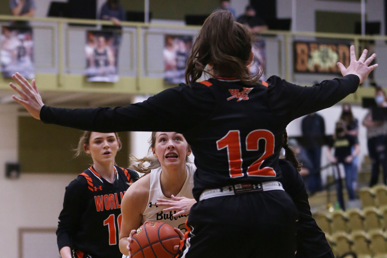 Ava Wagner pushes toward the basket